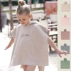 Kraamcadeau Poncho met naam (2 - 6 jaar)